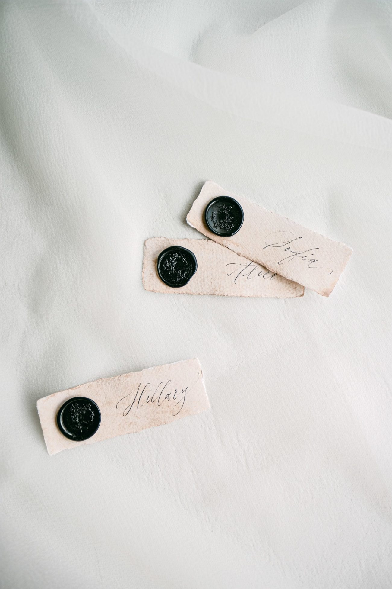 black wax seals blush place cards
