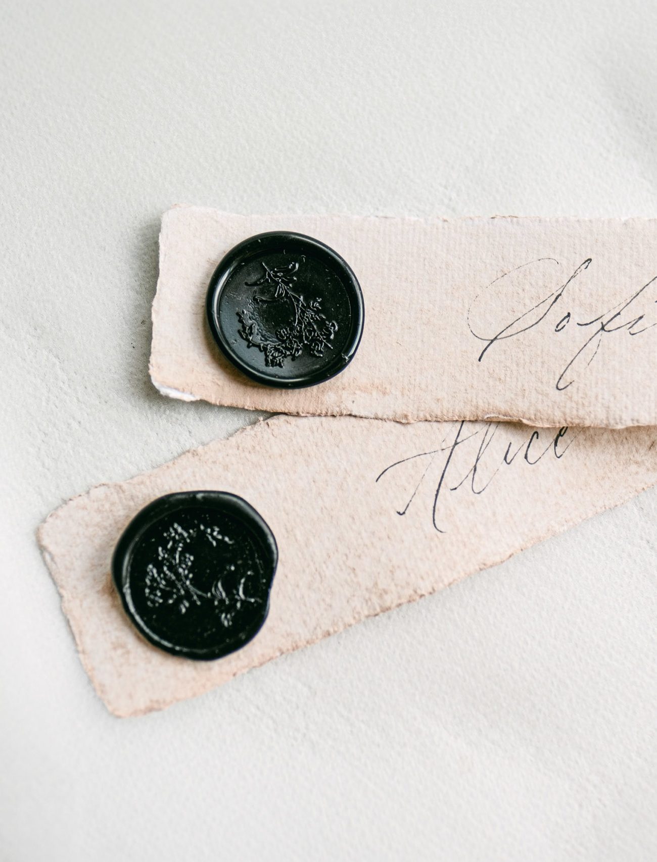 black wax seals blush place cards